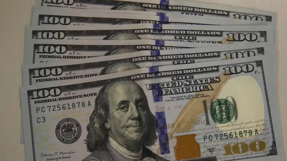 Dólar cai a R$ 5,11 após Fed manter juros nos EUA