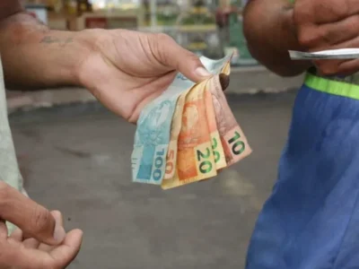 Brazil cuts key interest rate to 14.25 pct in third straight reduction