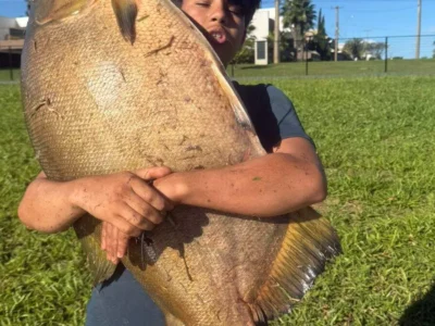 Brazil Teen Catches 88-Pound Fish; Mom Swears It’s Not AI